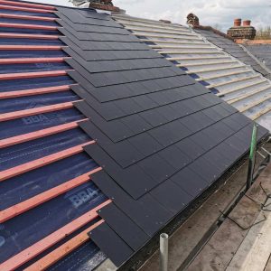 Reroof in fibre cement slate.
